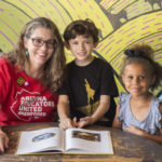 Jen Longdon reading books with school children (Michael Ging)